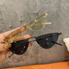 Women's Cat Eye Sunglasses - Luxury Metal Triangle Design with UV400 Protection